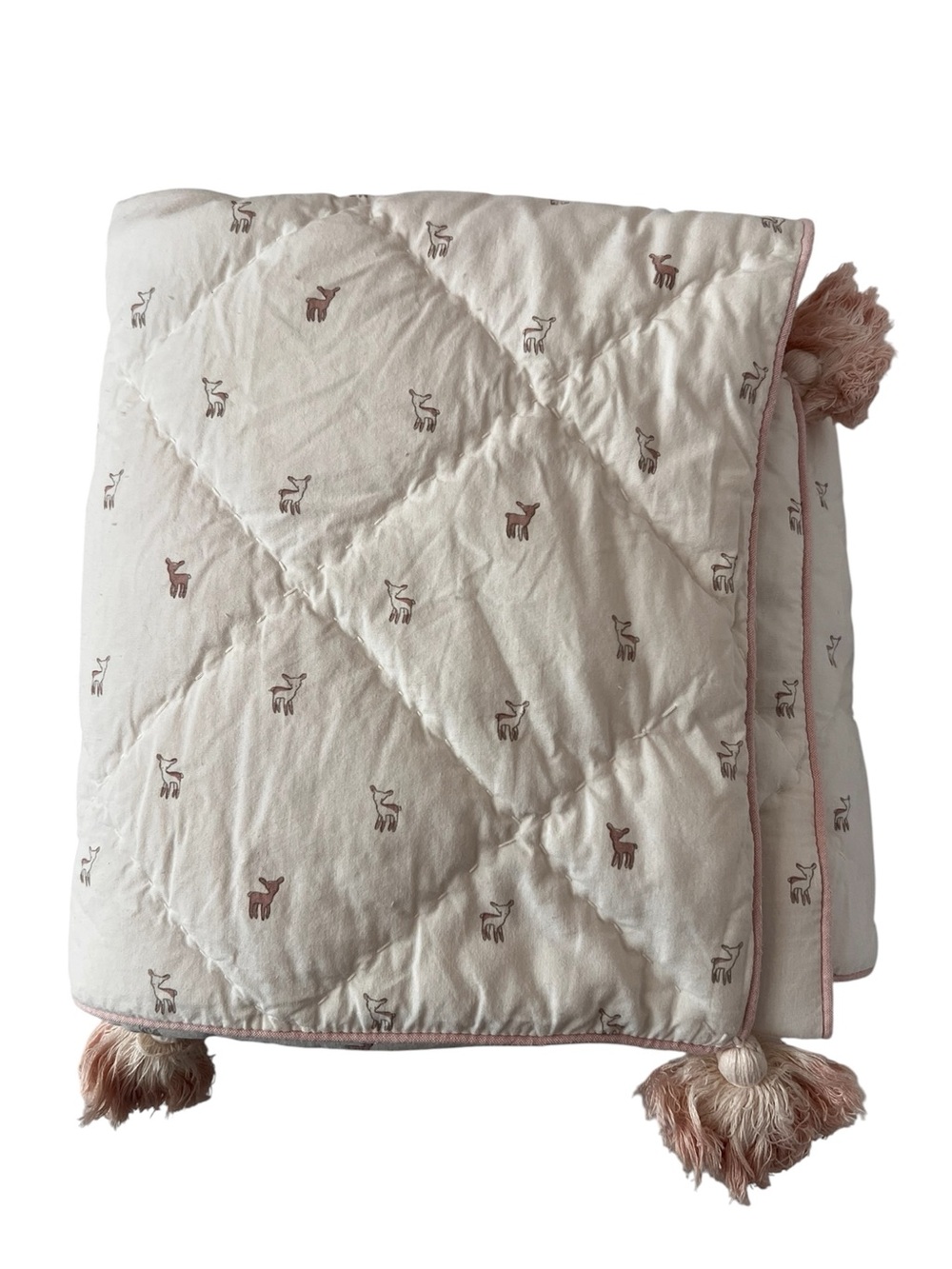 Pehr Cream and Blush Deer Print Quilted Throw Blanket with Tassels